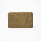 THCA Hash Marocaine Static – classic Moroccan-style static hash block with smooth pressed surface and light brown color
