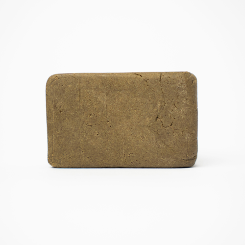 THCA Hash Marocaine Static – classic Moroccan-style static hash block with smooth pressed surface and light brown color
