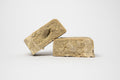 THCA Hash California Static – light-colored premium static hash blocks with sandy texture and high trichome purity
