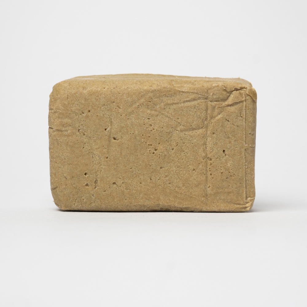 THCA Hash California Static – light beige static hash block with smooth pressed surface and refined trichome structure