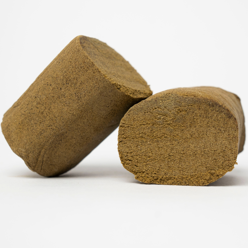THCA Hash Mousse – light brown mousse hash pieces with fluffy interior and smooth outer surface
