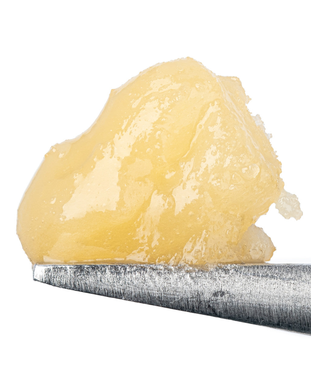 thca badder from the side on spatula